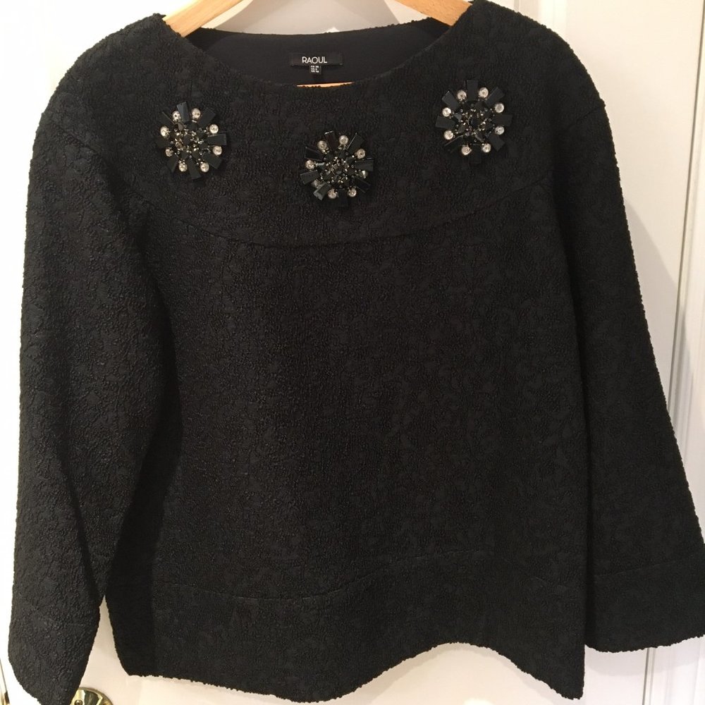 Black brocade sweatshirt with crystal accents. Size US6. NWT.